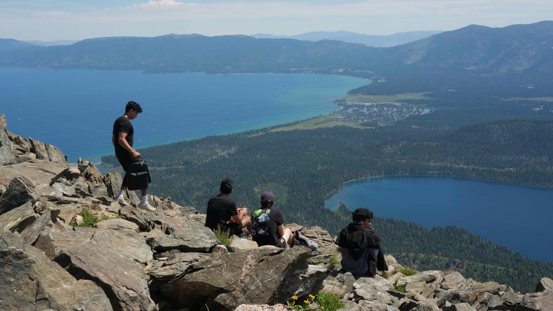 Friends overlooking Lake Tahoe from Mount Tallac
